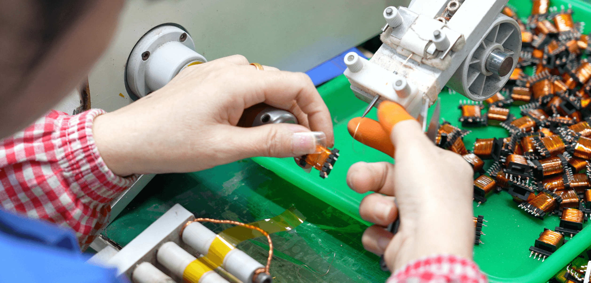 Manual PCB insertion on the production floor